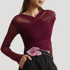 Elegant sheer wrap blouse by Lumina Wear featuring a flattering fit, perfect for stylish and sophisticated outfits.