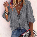 Brightly printed Lumina Wear Claire casual blouse with button front, featuring a vibrant, stylish design and relaxed fit.
