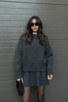 Lumina Wear women's cozy knit sweater set with matching mini skirt, stylish and comfortable outfit for casual wear.