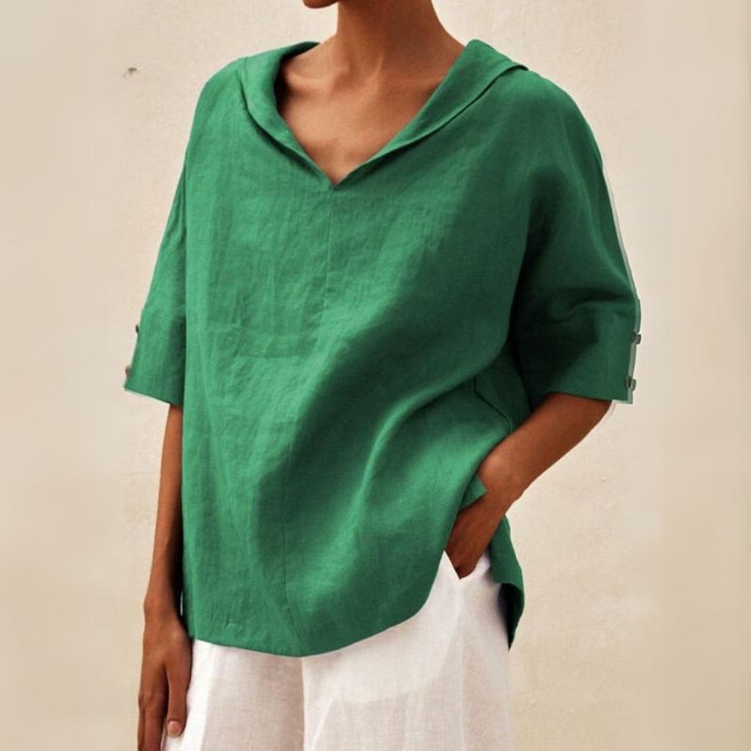 Lumina Wear Clara relaxed fit V-neck top, casual T-shirt with soft fabric and stylish design, worn with jeans.