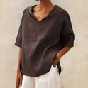 Lumina Wear Clara relaxed fit V-neck top in soft fabric, showcasing a casual yet stylish design with a comfortable fit.