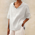 Lumina Wear Clara relaxed fit V-neck top in soft fabric, showcasing a casual and comfortable style with a flattering neckline.