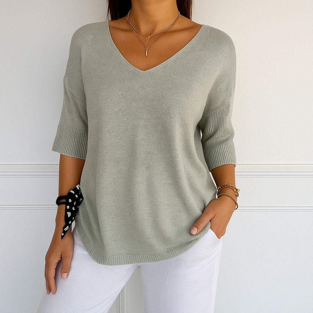Light gray Lumina Wear Clara relaxed V-neck women's sweater with minimalist design, soft knit fabric and casual fit.