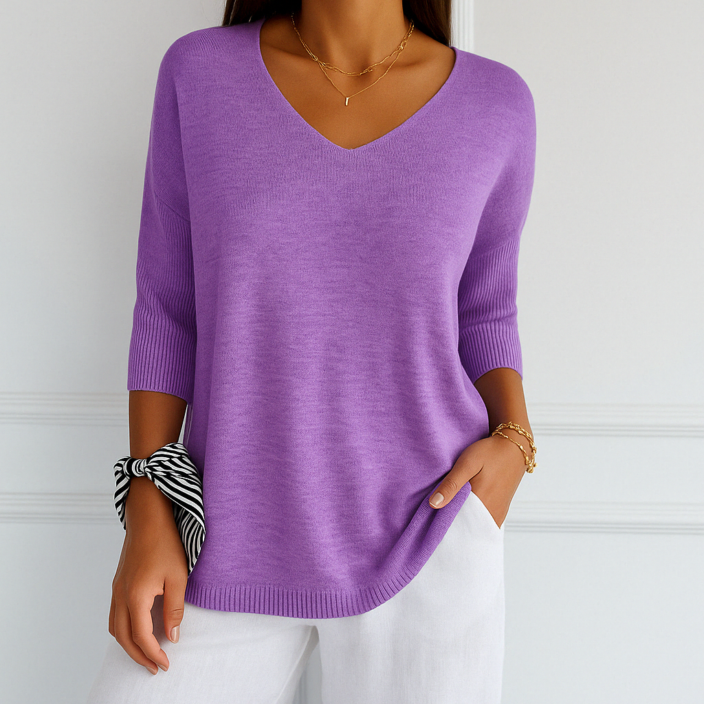 Lumina Wear Clara women's relaxed V-neck sweater with minimalist design, soft knit fabric, and casual fit.