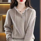 Lumina Wear Elise cozy V-neck hooded sweater with button details, soft knit fabric, and relaxed fit for casual wear.