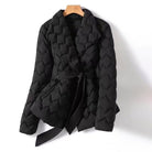 Lumina Wear Elise geometric down puffer jacket with belted waist, tailored fit, and quilted design for stylish winter warmth.