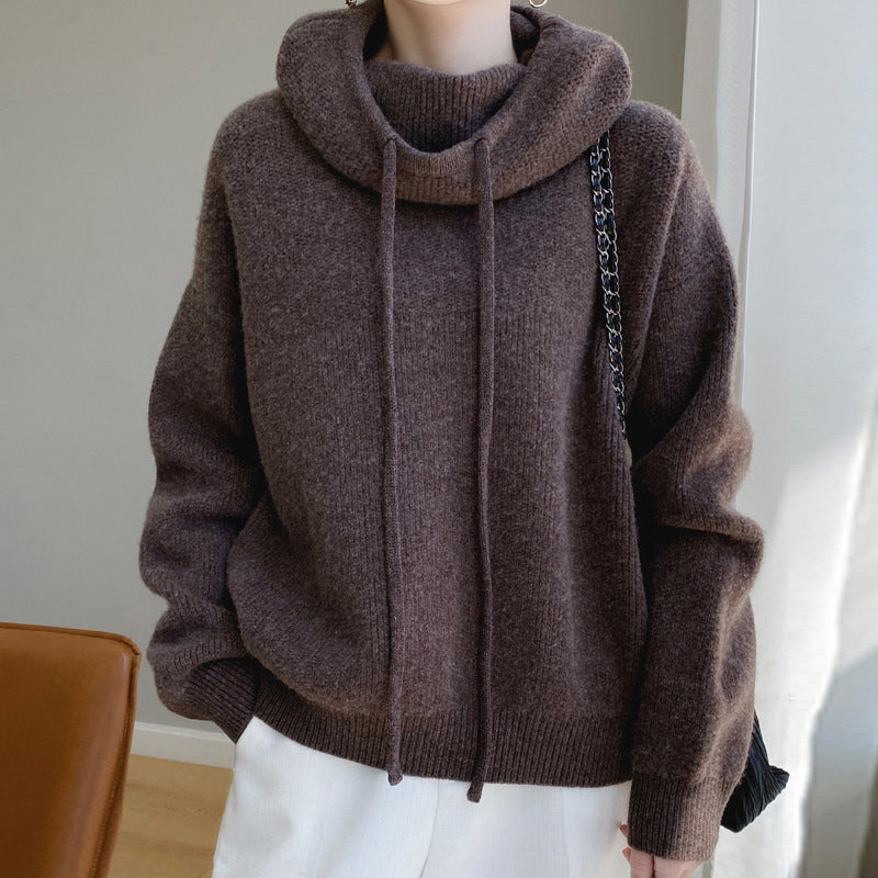 Lumina Wear Elise ultra-soft relaxed fit merino wool sweater with tailored hood, shown in a cozy, casual style.