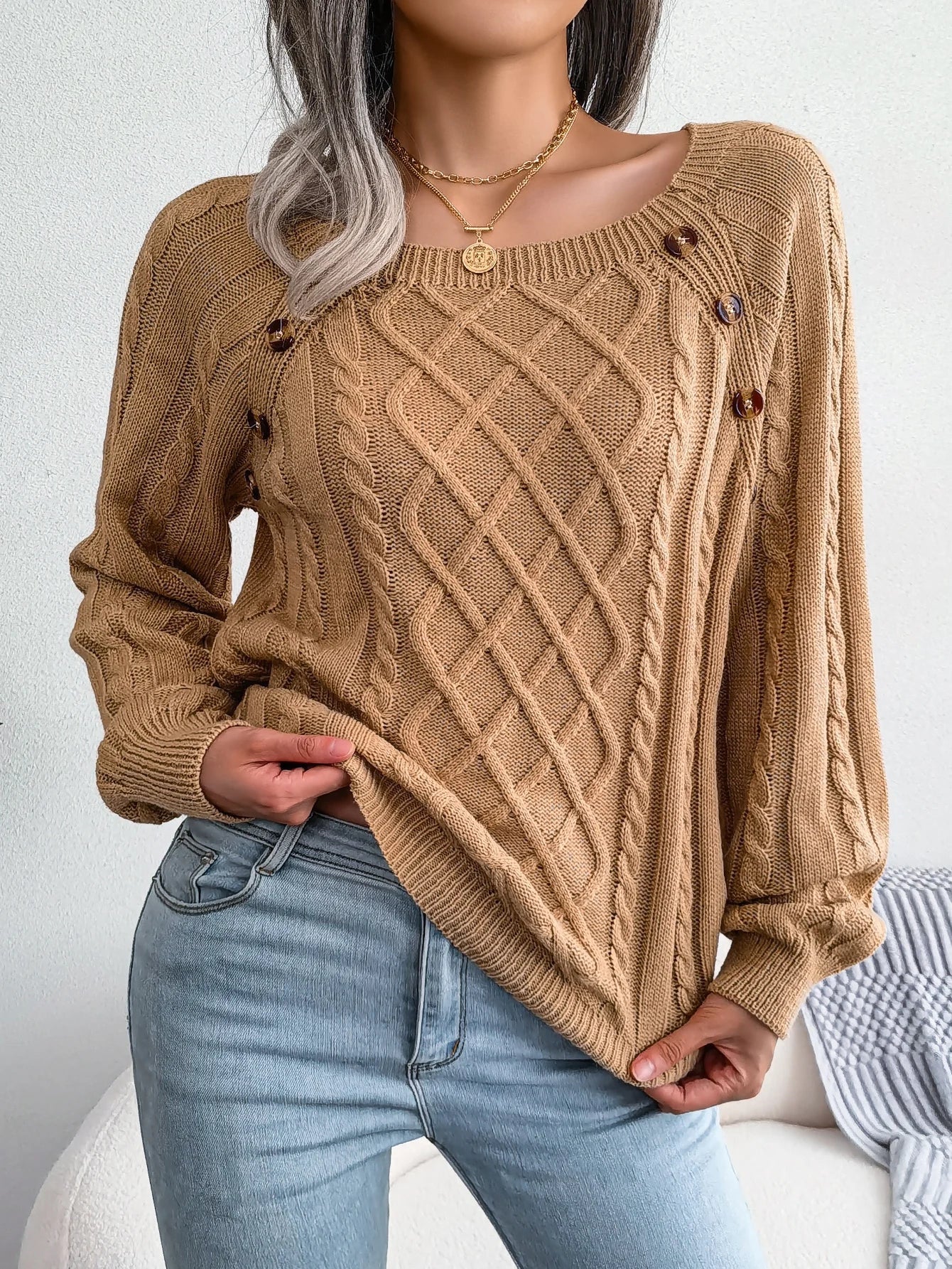 Lumina Wear Emilia women's cable-knit sweater with relaxed fit and button accents, cozy and stylish for casual wear.
