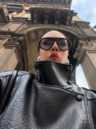 Women’s oversized structured high-neck faux leather jacket by Lumina Wear, featuring a bold, fashionable design and sleek black finish.