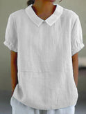 Linen blouse with Peter Pan collar by Lumina Wear, featuring a charming, lightweight design and classic detailing.