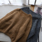 Lumina Wear Fiorentina vintage V-neck sweater with soft draped fabric and comfortable fit, shown in a relaxed, stylish design.