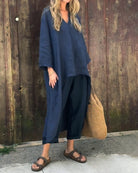 Light beige Florence Lumina Wear relaxed elegance tunic and pant set displayed on a hanger, showcasing comfortable, stylish loungewear.