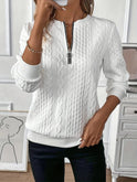 Lumina Wear Freya women's top featuring an elegant half-zip design and polished fit, shown in a stylish, well-fitted view.