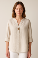Light blue Gabrielle relaxed fit blouse with button details from Lumina Wear, featuring a casual, comfortable design.