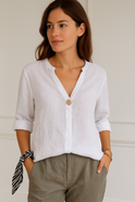 Lumina Wear Gabrielle relaxed fit blouse with button details, featuring lightweight fabric and casual style, shown on a model.