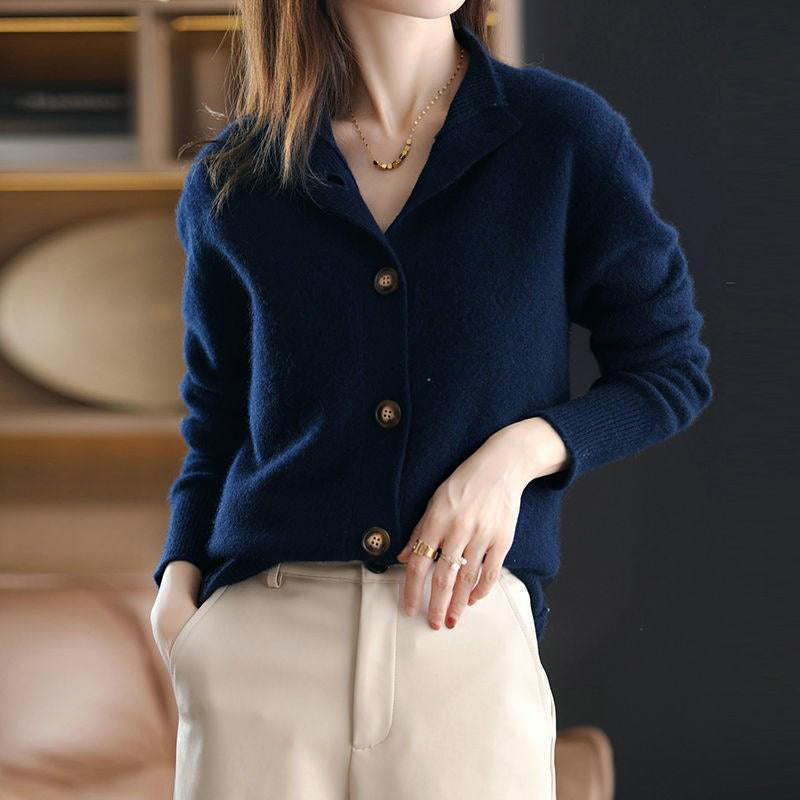 Light gray women's high neck cardigan with button details from Lumina Wear, styled with soft fabric and elegant design.