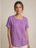 Light beige Lumina Wear Grace linen blouse with relaxed fit and button details, featuring a comfortable, casual style.