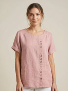 Lumina Wear Grace relaxed linen blouse featuring button details, draped fit, and casual style, perfect for everyday wear.