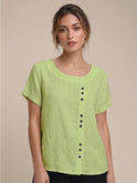 Light beige Lumina Wear Grace linen blouse with relaxed fit and button details, displayed on a model.