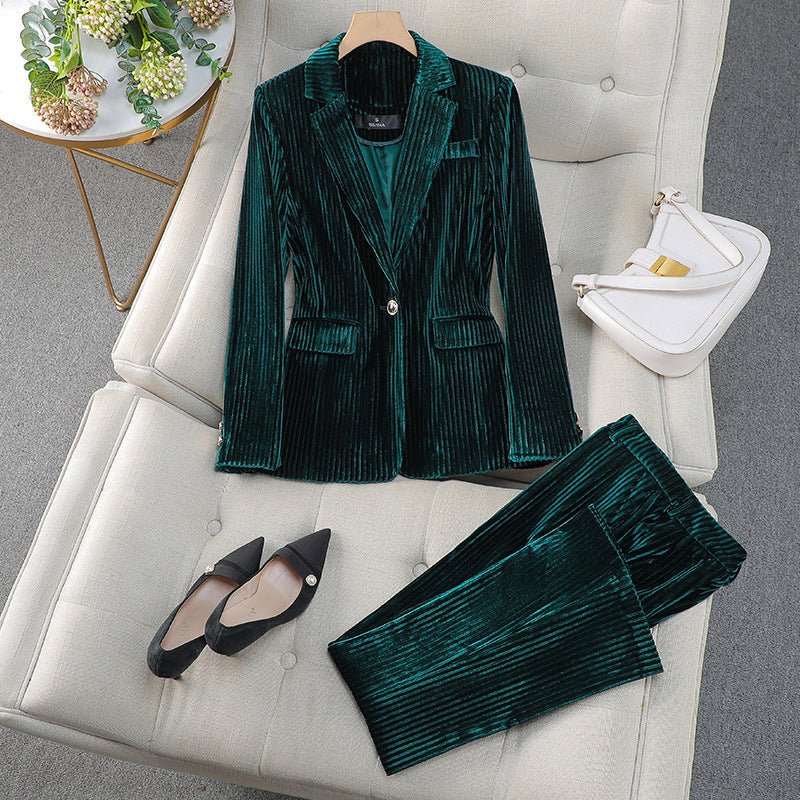 Women's tailored blazer and trousers set with polished silhouette from Lumina Wear, featuring a sleek, professional look.