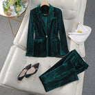 Women's tailored blazer and trousers set with polished silhouette from Lumina Wear, featuring a sleek, professional look.