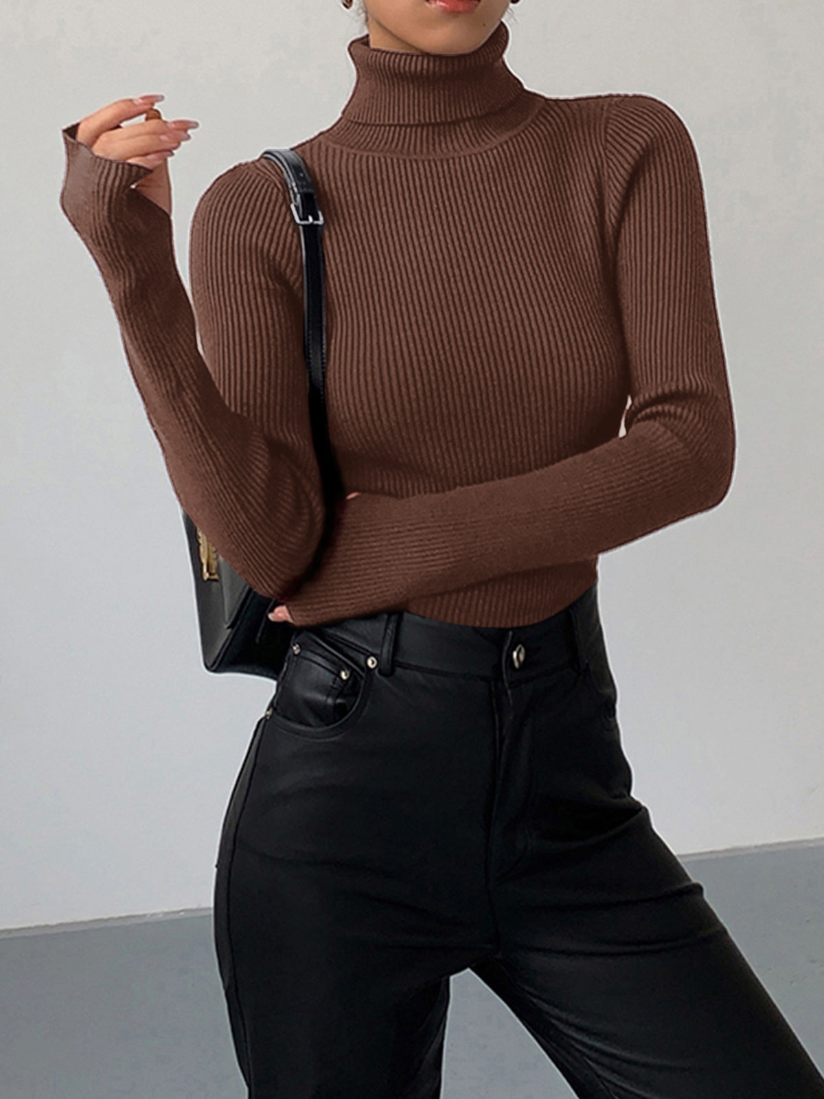 Lumina Wear Hailey sleek minimalist turtleneck top for winter, featuring a fitted design and smooth fabric in a neutral color.