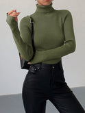 Lumina Wear Hailey sleek minimalist turtleneck sweater for winter, featuring a fitted design and neutral color, perfect for elegant layering.