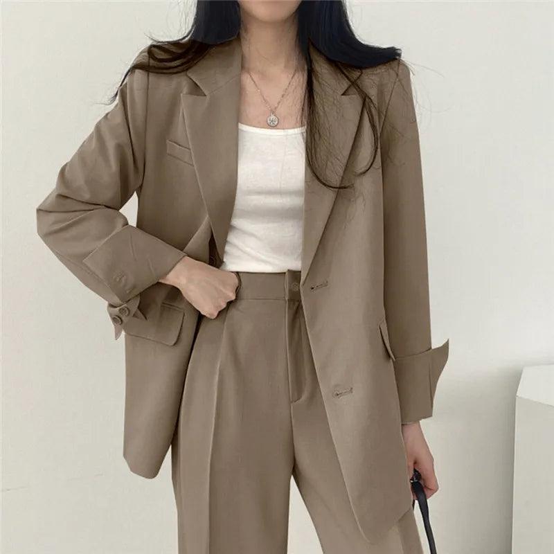 Lumina Wear Hailey tailored blazer and high-waisted trousers suit set, stylish and modern formal wear for women.