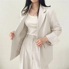 Lumina Wear Hailey tailored blazer and high-waisted trousers suit set, elegant women's formal business attire.
