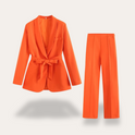 Hazel women's suit set featuring an elegant belted blazer and wide-leg trousers by Lumina Wear, styled together for a sophisticated look.