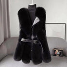 Isabella Lumina faux fur vest with leather trim, belted waist, and sleek silhouette, featuring a stylish and cozy design.