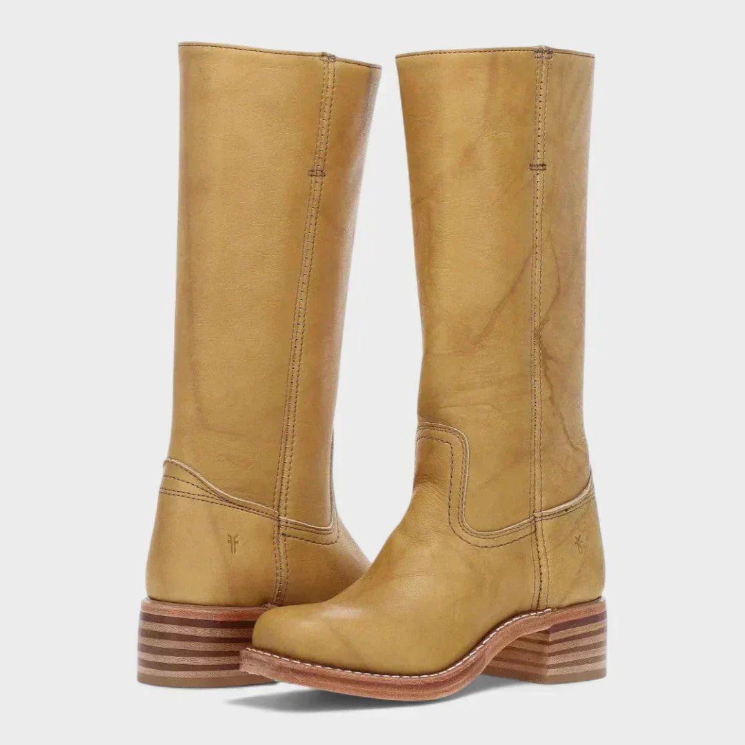 Black leather knee-high orthopedic boots with retro style by Lumina Wear, featuring a sleek design and sturdy heel for women.