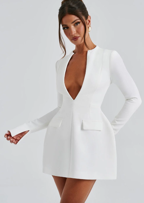 Lumina Wear Isabella women's mini dress with bold deep V-neckline, long sleeves with thumb holes, and fitted style.