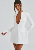 Lumina Wear Isabella mini dress with bold deep V-neckline, long sleeves with thumb holes, fitted silhouette in black fabric