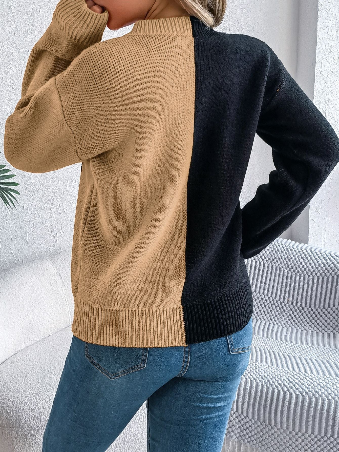 Lumina Wear Isabella women's knit pullover in bold orange and black with a Jack-o'-Lantern design, cozy fall sweater.