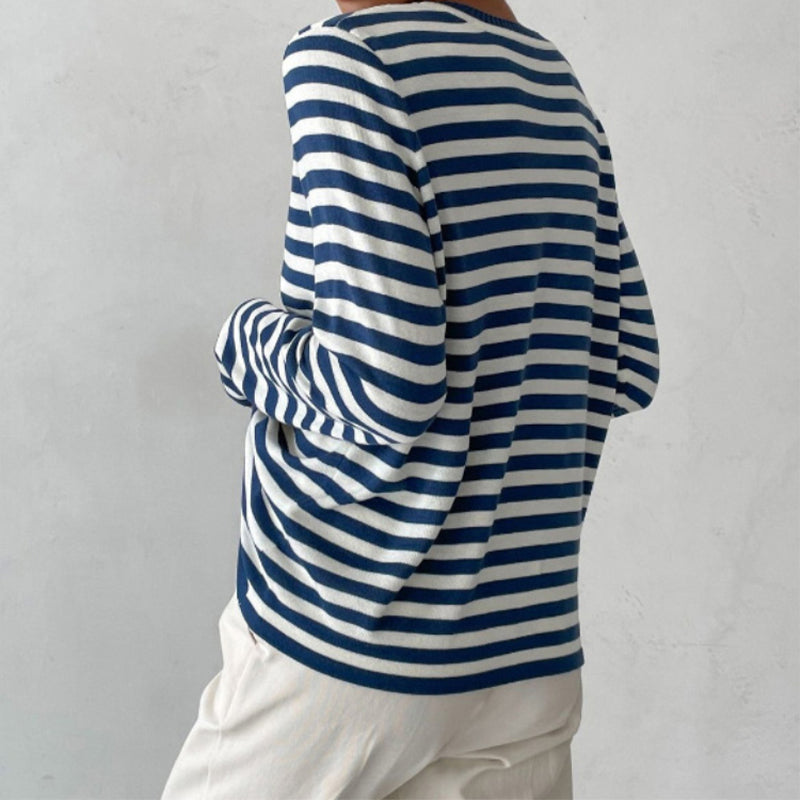 Lumina Wear Isabella bold striped relaxed fit sweater with ribbed neckline, featuring colorful horizontal stripes and soft knit fabric