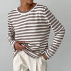 Lumina Wear Isabella bold striped relaxed fit sweater with ribbed neckline, showcasing cozy knit fabric and vibrant pattern.