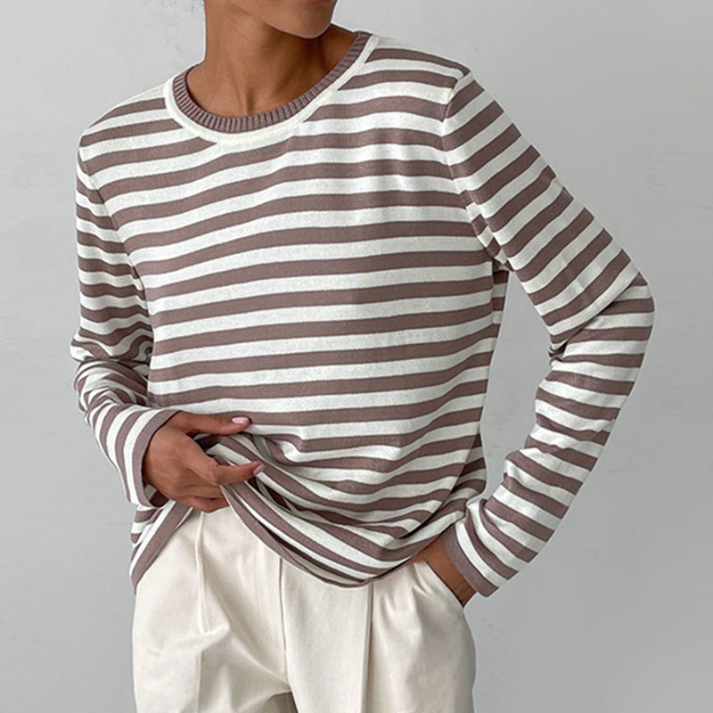 Lumina Wear Isabella bold striped relaxed fit sweater with ribbed neckline, showcasing cozy knit fabric and vibrant pattern.