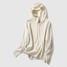 Lumina Wear Isabella cozy hooded thick knit sweater with a loose fit, featuring a warm, textured fabric and relaxed style.