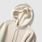 Isabella Lumina Wear cozy hooded thick knit sweater with loose fit, featuring soft fabric and casual style, worn relaxed fit on a model.