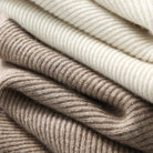 Lumina Wear Isabella cozy hooded thick knit sweater with a loose fit, shown in a soft, textured fabric with a relaxed style.