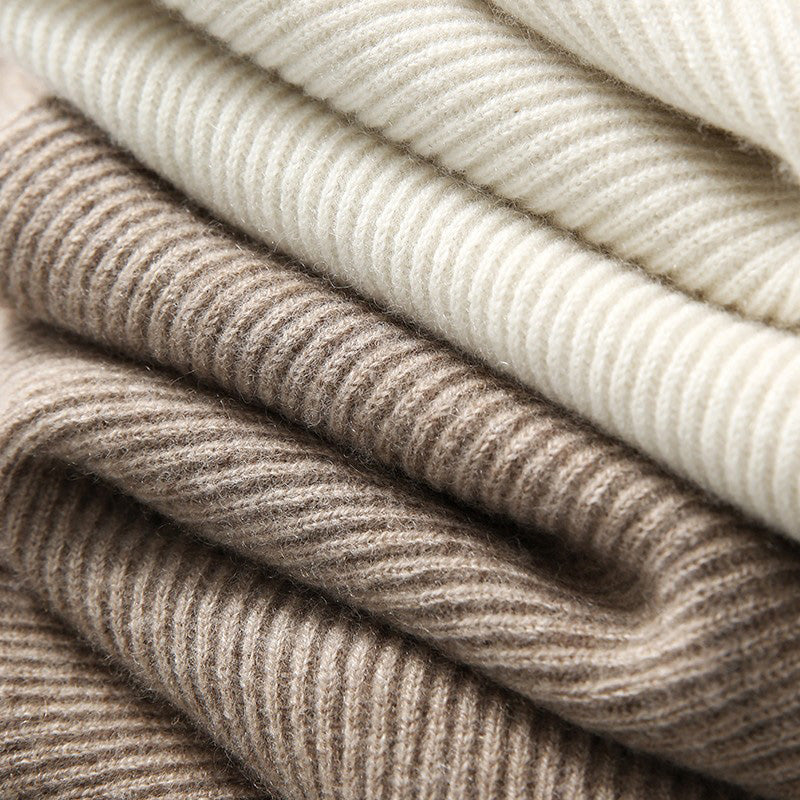 Lumina Wear Isabella cozy hooded thick knit sweater with a loose fit, shown in a soft, textured fabric with a relaxed style.
