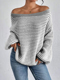 Isabella Lumina Wear cozy oversized knit sweater with lantern sleeves, soft texture, and relaxed fit, perfect for casual wear.