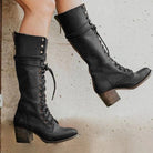 Black knee-high lace-up boots with side zipper for women, stylish and elegant, by Lumina Wear.