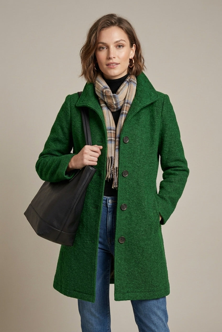 Elegant women's wool coat with notch collar and button front by Lumina Wear, mid-length style suitable for cold weather.