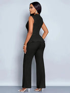 Elegant women's peplum top and flowing trousers two-piece set by Lumina Wear, stylish and comfortable for chic summer looks.