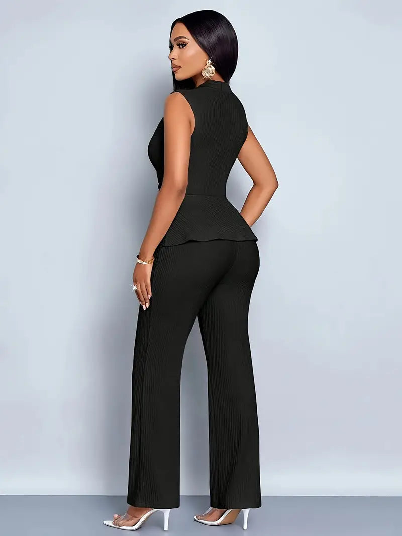 Elegant women's peplum top and flowing trousers two-piece set by Lumina Wear, stylish and comfortable for chic summer looks.