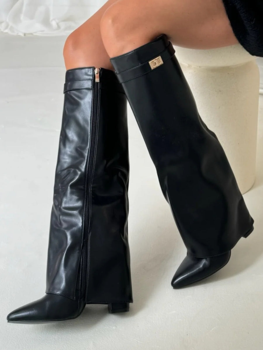 Black knee-high boots for women with pointed toes and side zipper from Lumina Wear's Isabella collection.