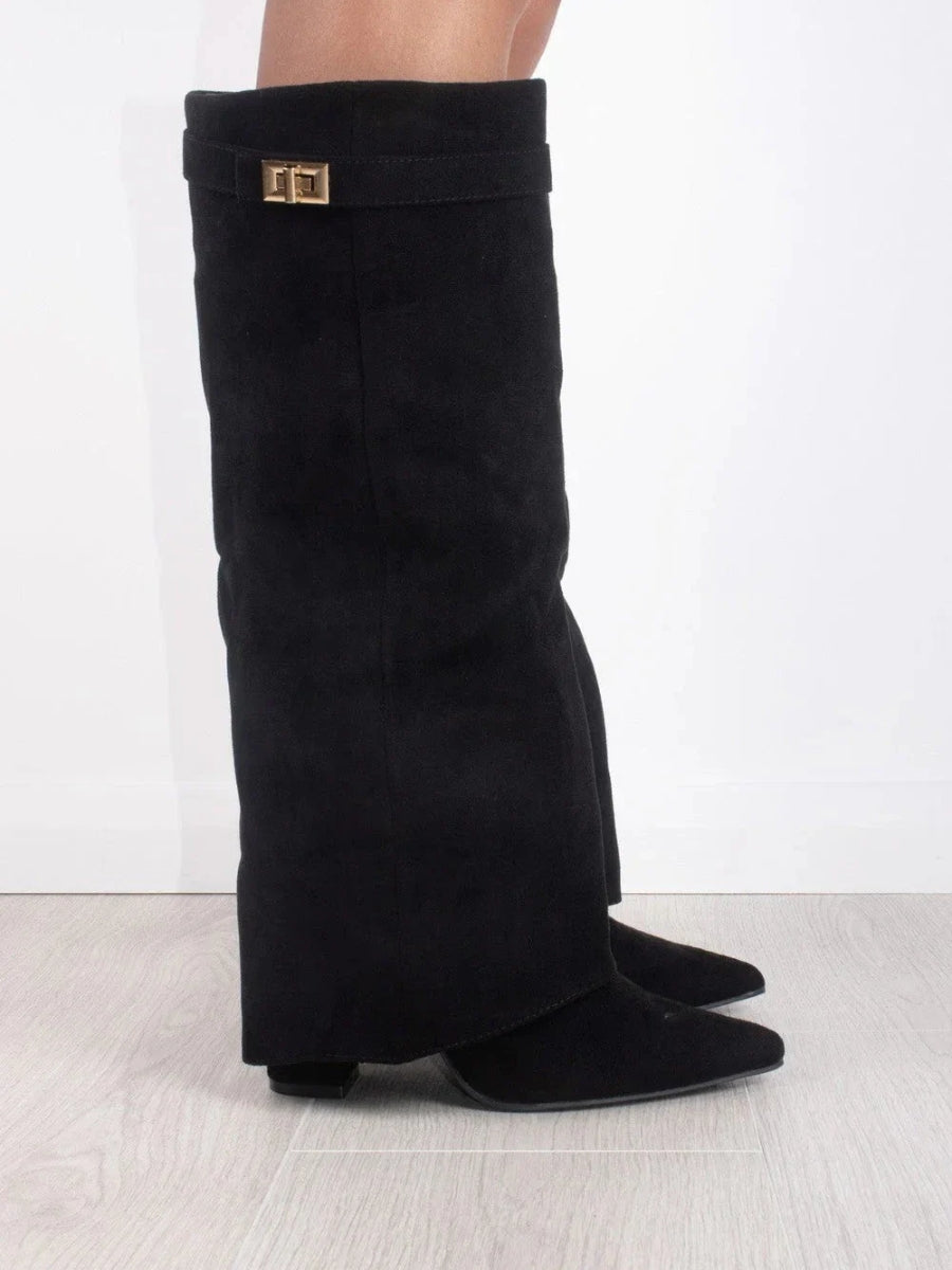 Black knee-high boots for women by Lumina Wear featuring pointed toes and side zippers, stylish and elegant footwear.