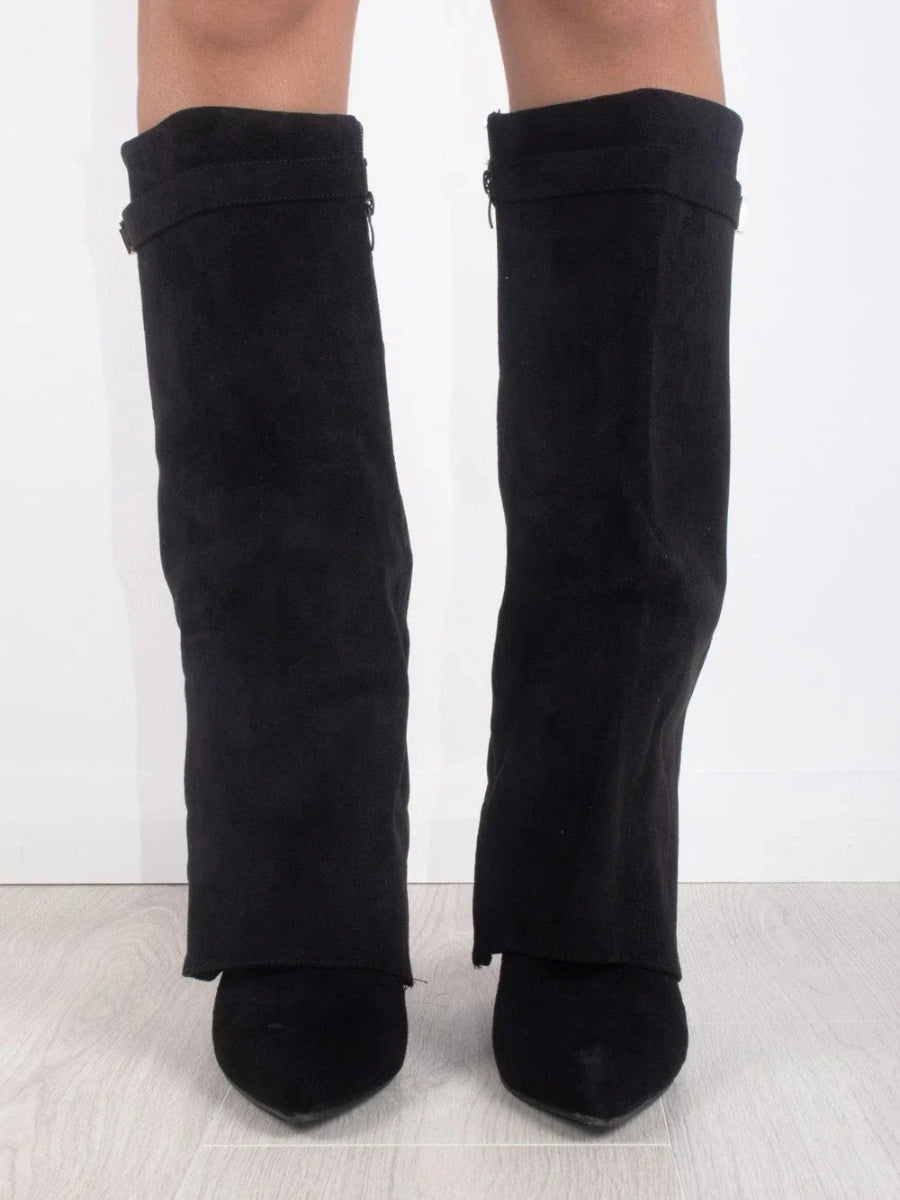 Black knee-high boots with pointed toes and side zippers from Lumina Wear's Isabella collection, designed for elegant women's footwear.